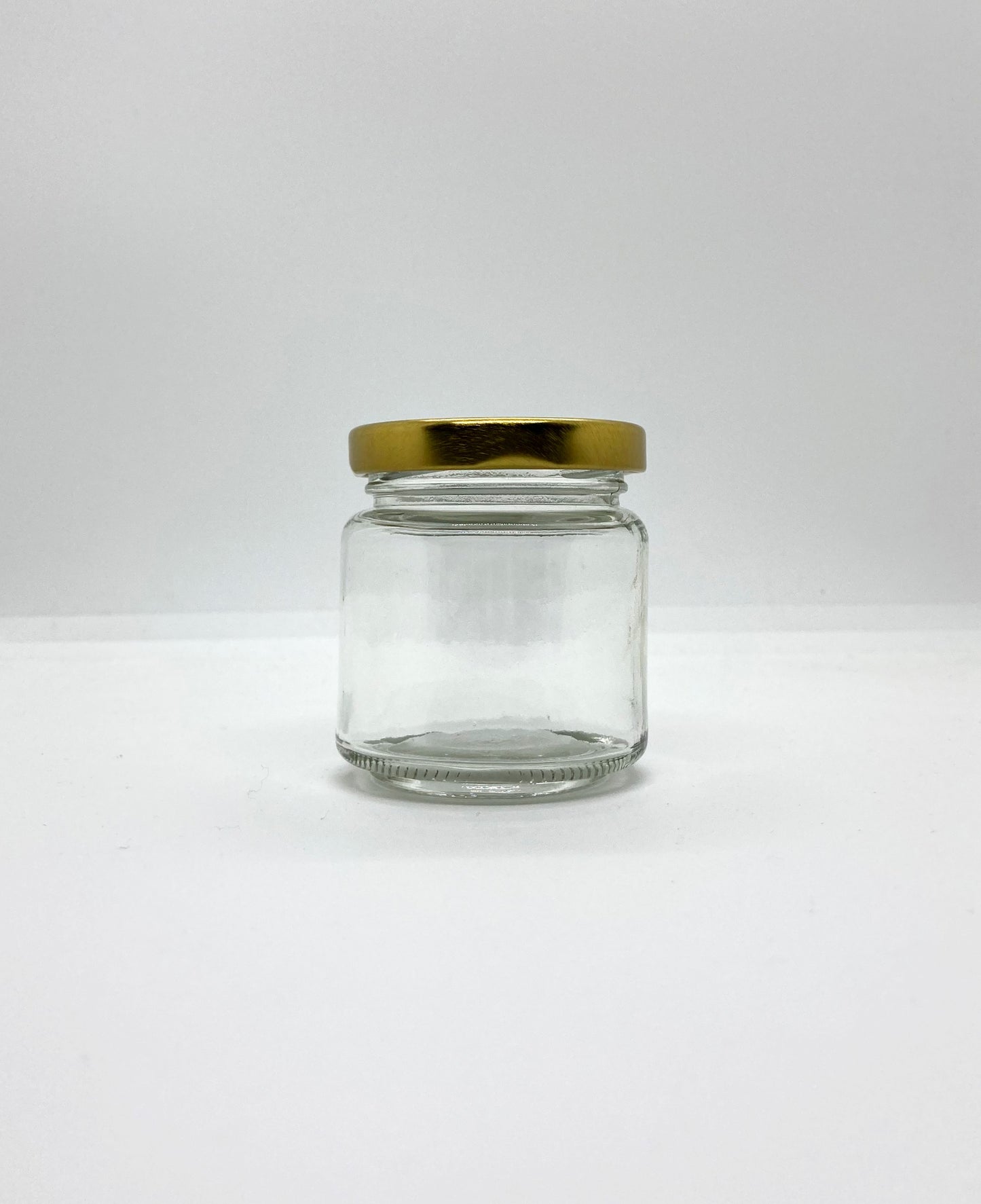 100mL. Clear Round Straight Cut Glass Jar and Lid