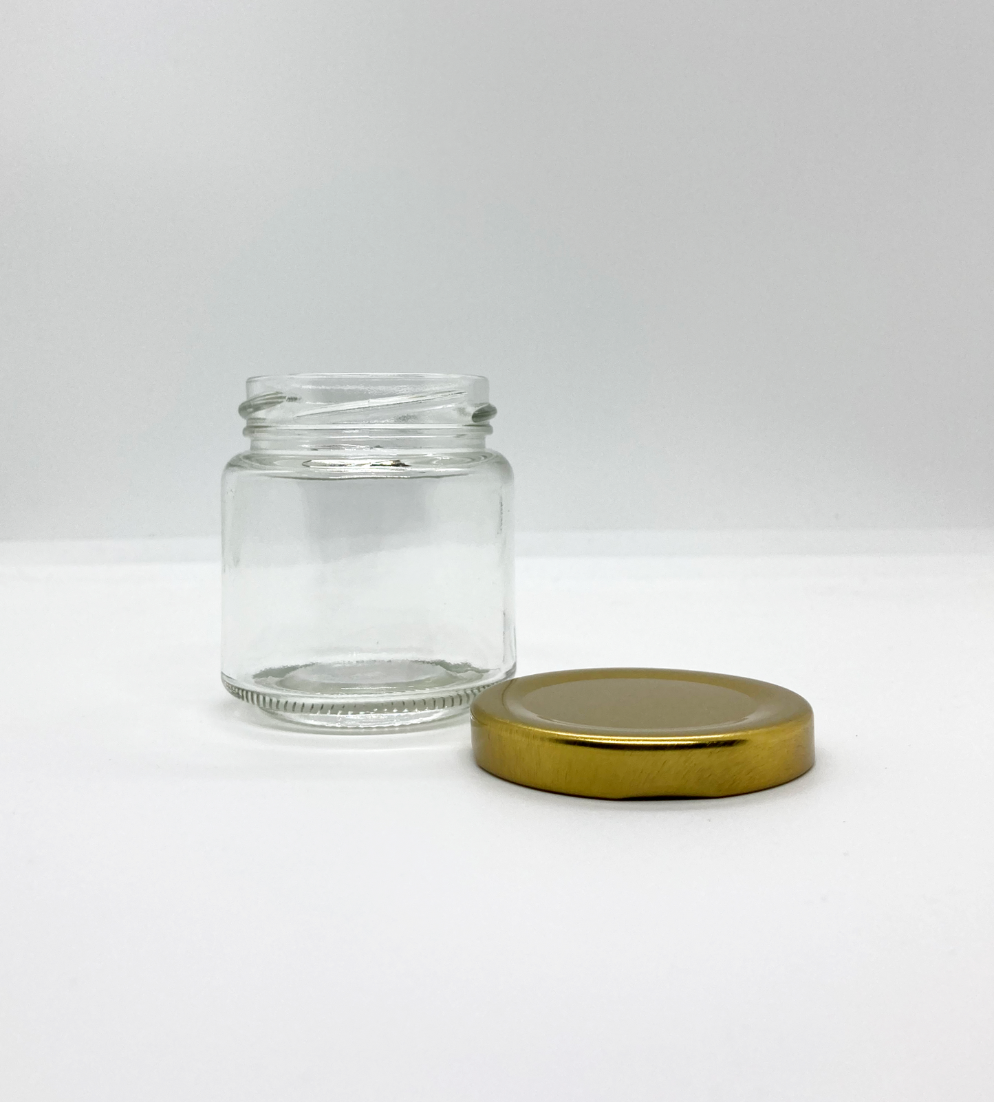 100mL. Clear Round Straight Cut Glass Jar and Lid