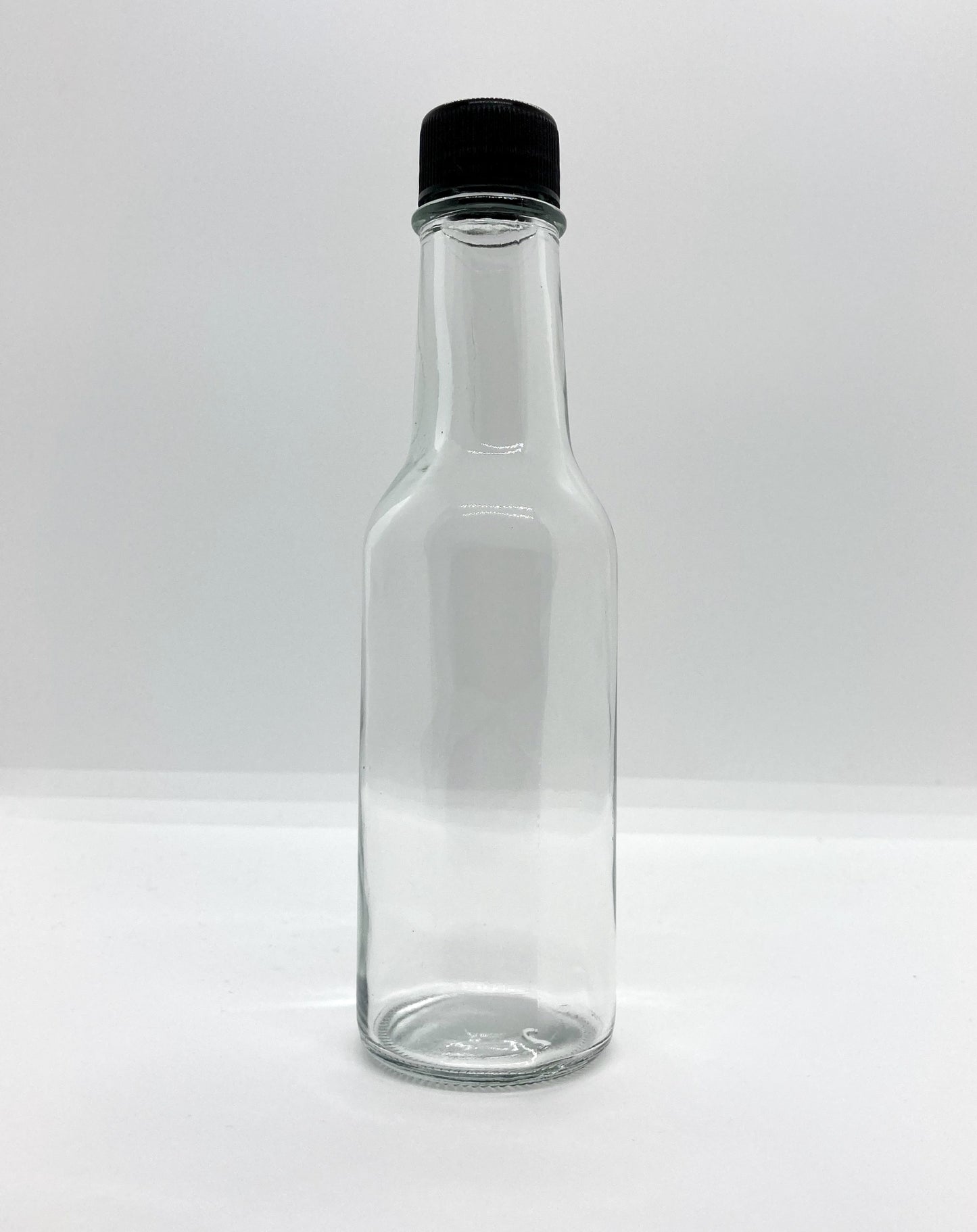 150mL. (Woozy Bottle) Clear Round Glass Bottle with Black Cap